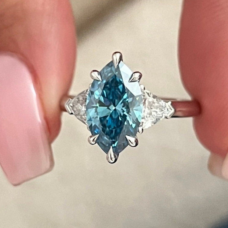 2.51TCW Marquise Fancy Vivid Blue Diamond Side Trillions Three Stone Engagement Ring