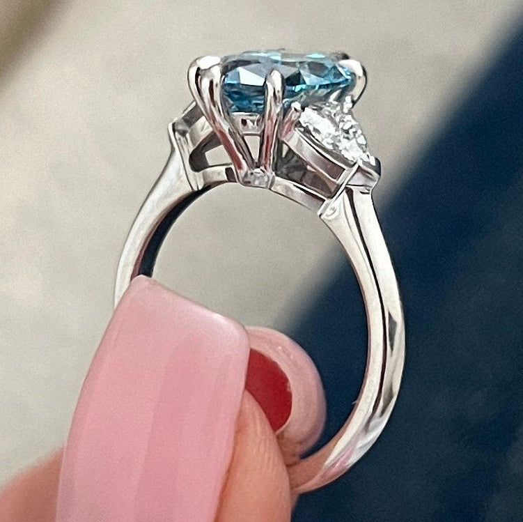 2.51TCW Marquise Fancy Vivid Blue Diamond Side Trillions Three Stone Engagement Ring