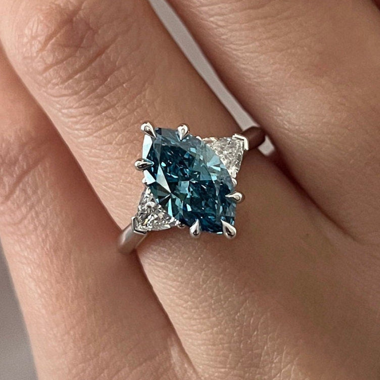 2.51TCW Marquise Fancy Vivid Blue Diamond Side Trillions Three Stone Engagement Ring