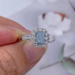 1.95tcw Radiant Intense Blue Lab Grown Diamond Halo Three Stone Engagement Ring