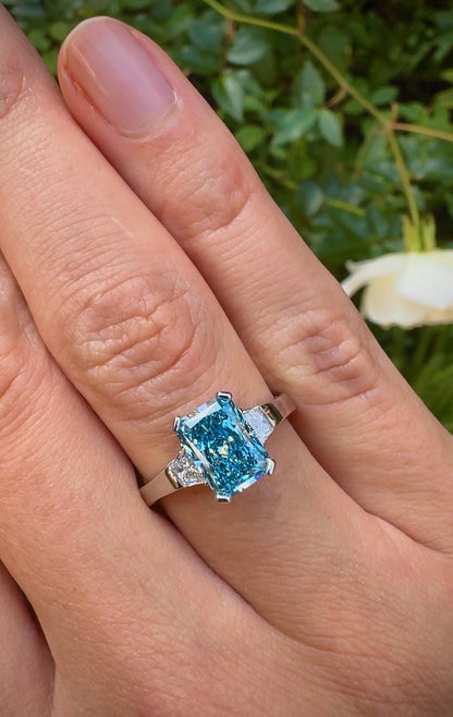 2.50 TCW Radiant Cut Vivid Blue Lab Grown Diamond Three Stone Engagement Ring