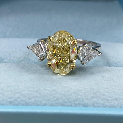 4.40CTW Intense Yellow Oval Cut Lab Grown Diamond 3 Stone Hidden Halo Engagement Ring