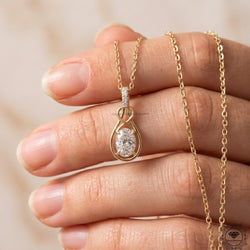 Oval Lab Grown Diamond Infinity Knot Pendant Necklace 14K - GrownDiamondJewels