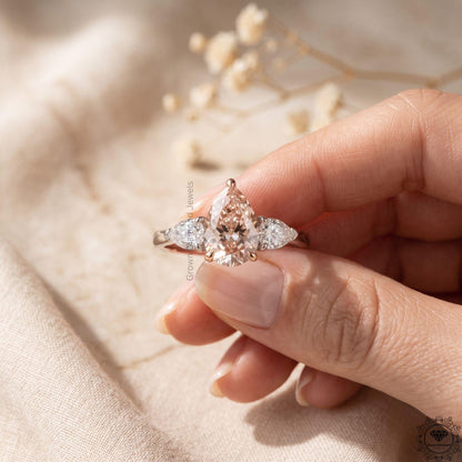 Pear Cut Fancy Intense Pink Lab Grown Diamond 3 Stone Ring
